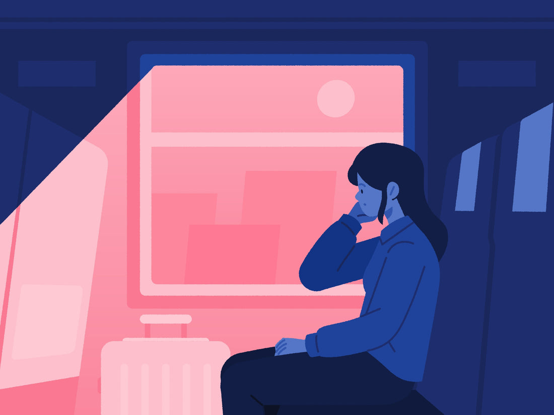 woman alone on dark train at night symbolizing the Fear of Starting Over in Your 30s or 40s