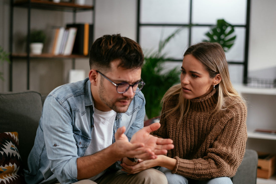 Couple reconnecting after an argument, representing relationship repair and emotional reconnection