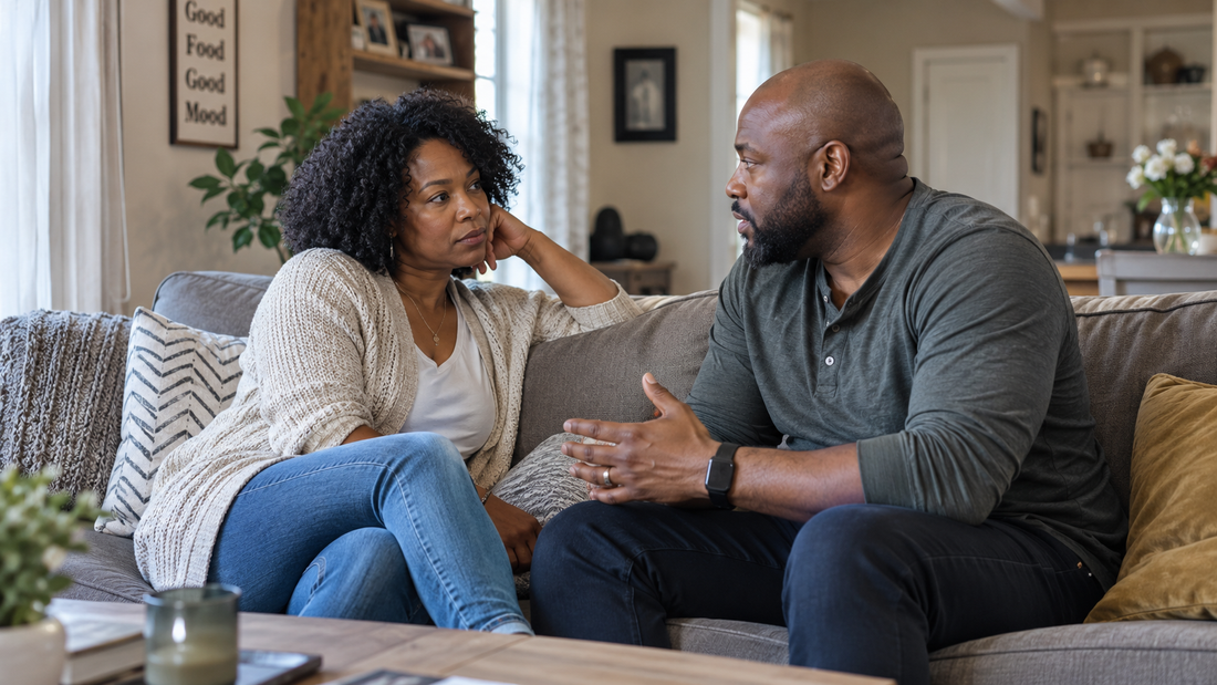 Couple having a calm conversation together at home, representing emotional reconnection, open communication and rebuilding closeness in a relationship.