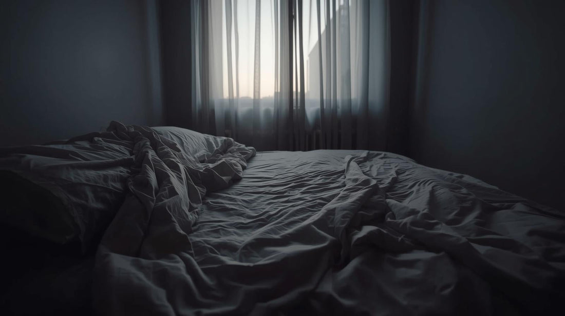 Unmade bed with one side deeply indented and the other untouched, symbolizing fear of being alone despite relationship unhappiness