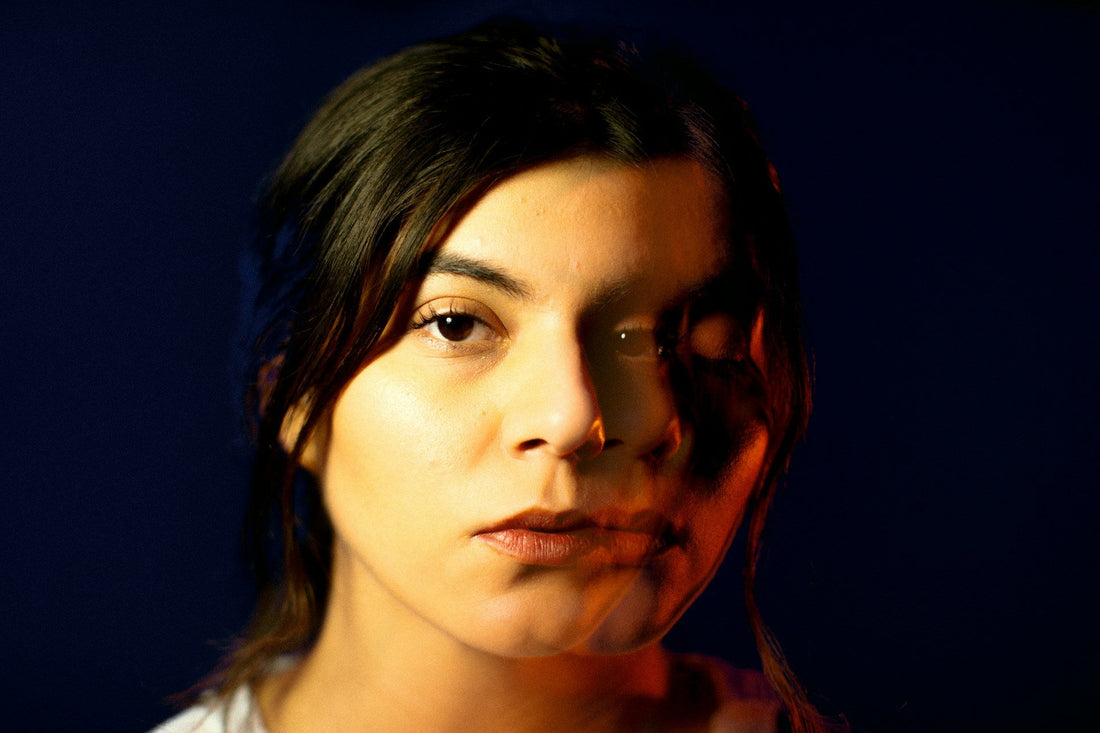 Woman’s face partly obscured by shadow, symbolizing fear, uncertainty, and rebuilding life after narcissistic abuse.