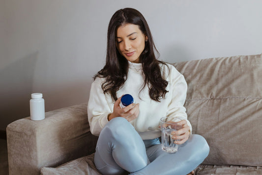 Woman reviewing female libido supplements while considering their evidence, ingredients and possible health risks
