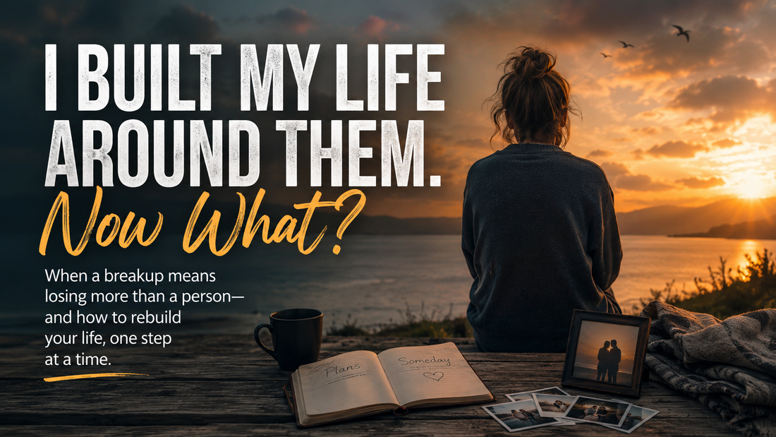 Woman sitting alone overlooking a lake at sunset after a breakup, reflecting on lost plans, identity, and rebuilding life after a relationship ends.