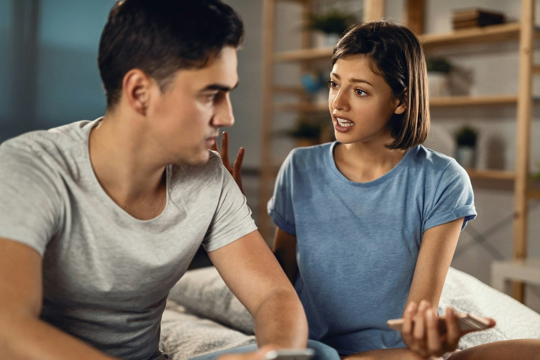 Couple having a serious conversation about jealousy, trust and healthy relationship boundaries