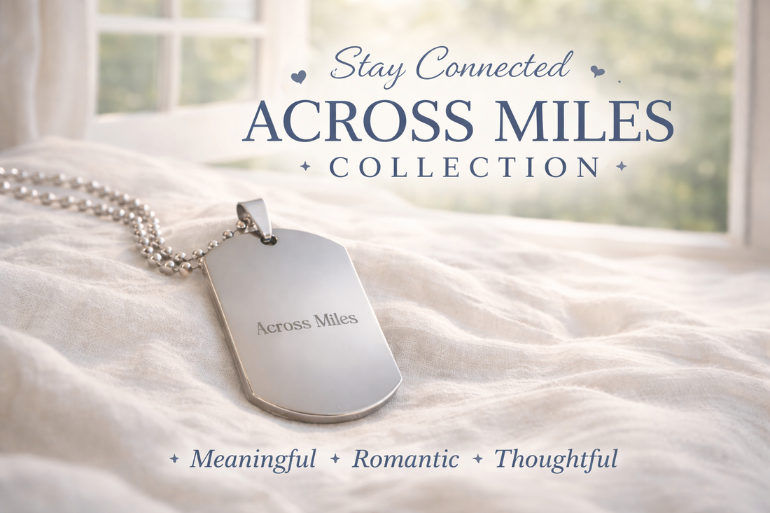 Across Miles dog tag necklace on soft linen near window promoting Left Unsaid long distance relationship collection