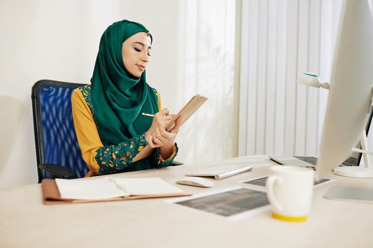 Muslim woman completing a marriage compatibility checklist at her desk before deciding whether to proceed toward nikah.