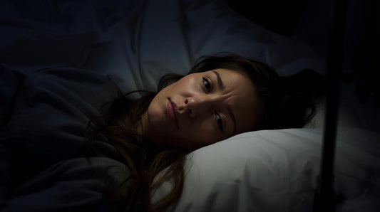 Woman awake at night questioning whether her ex ever loved her deeply
