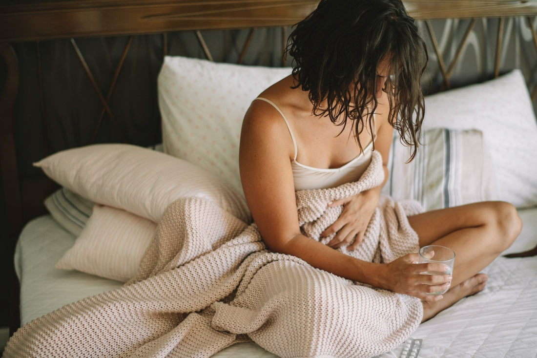 Woman experiencing pain during sex while relationship intimacy becomes difficult