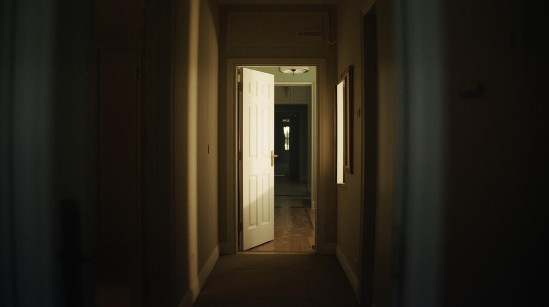 Open apartment doorway with soft light symbolizing re-entering dating after a breakup