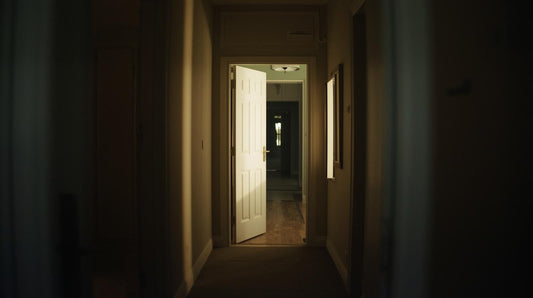 Open apartment doorway with soft light symbolizing re-entering dating after a breakup