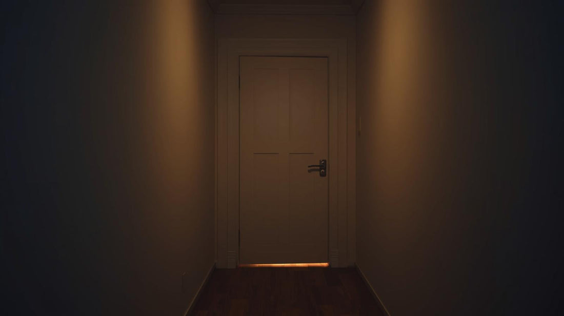 Closed interior door with warm light visible underneath, symbolizing emotional withholding and the silent treatment in a narcissistic relationship