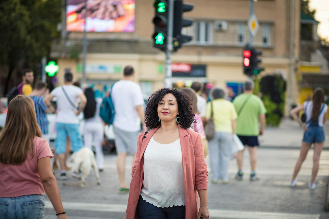 A woman walking alone coping with her single life after a relationship