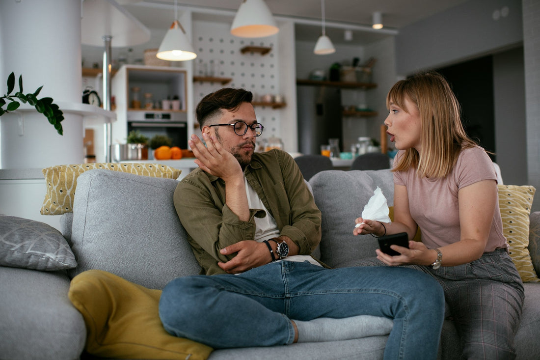 Couple discussing texting habits, privacy and controlling behaviour in a relationship