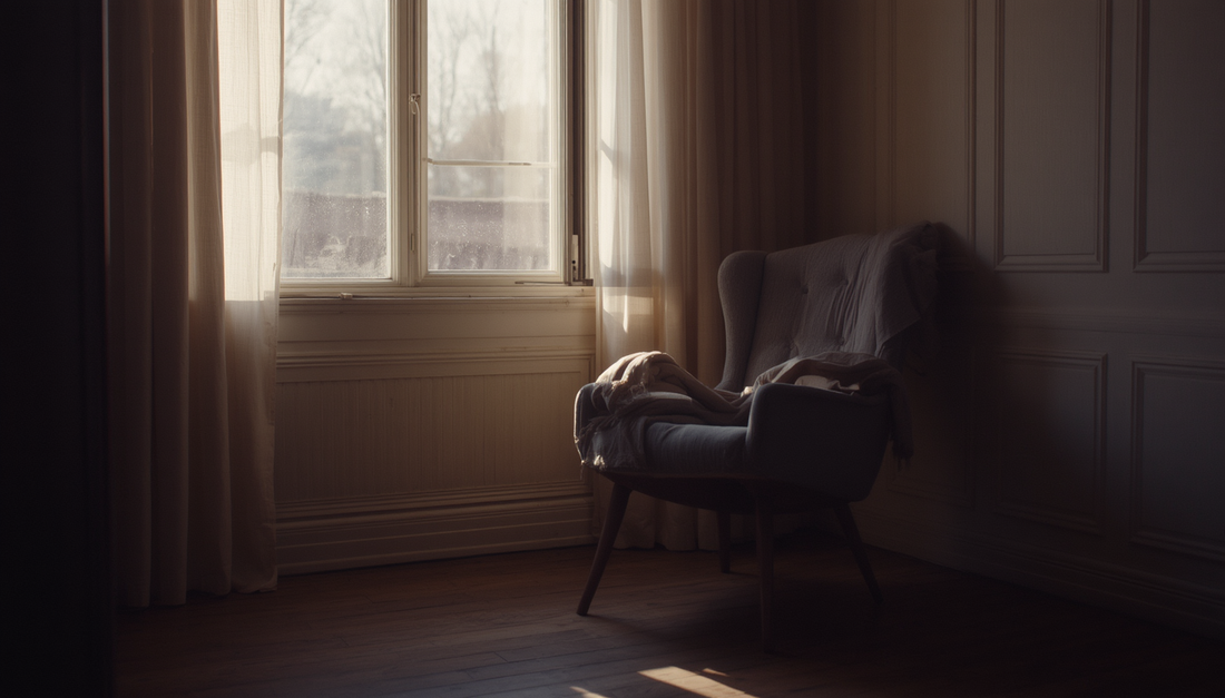 A quiet empty room with soft light, symbolizing why emotional pain can still hurt after a breakup.
