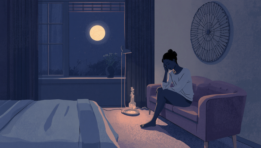 Editorial illustration of a lone reflective figure in a quiet room at night, symbolizing why nights feel harder after a breakup.