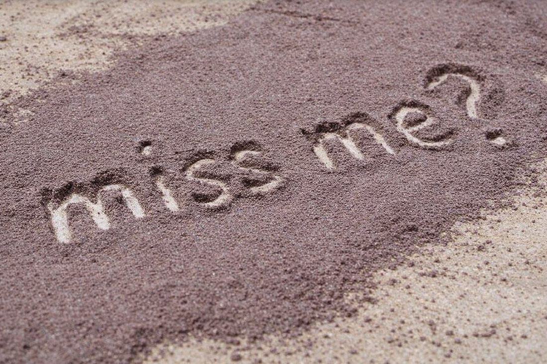 Will my ex miss me written in sand on a beach
