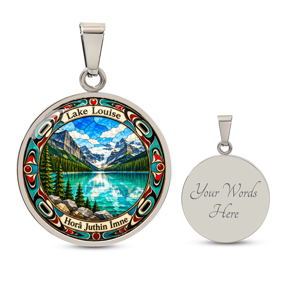 Silver finish Lake Louise pendant necklace showing bright blue mountain lake, snowy peaks, pine trees and decorative stained-glass artwork with engraving option.
