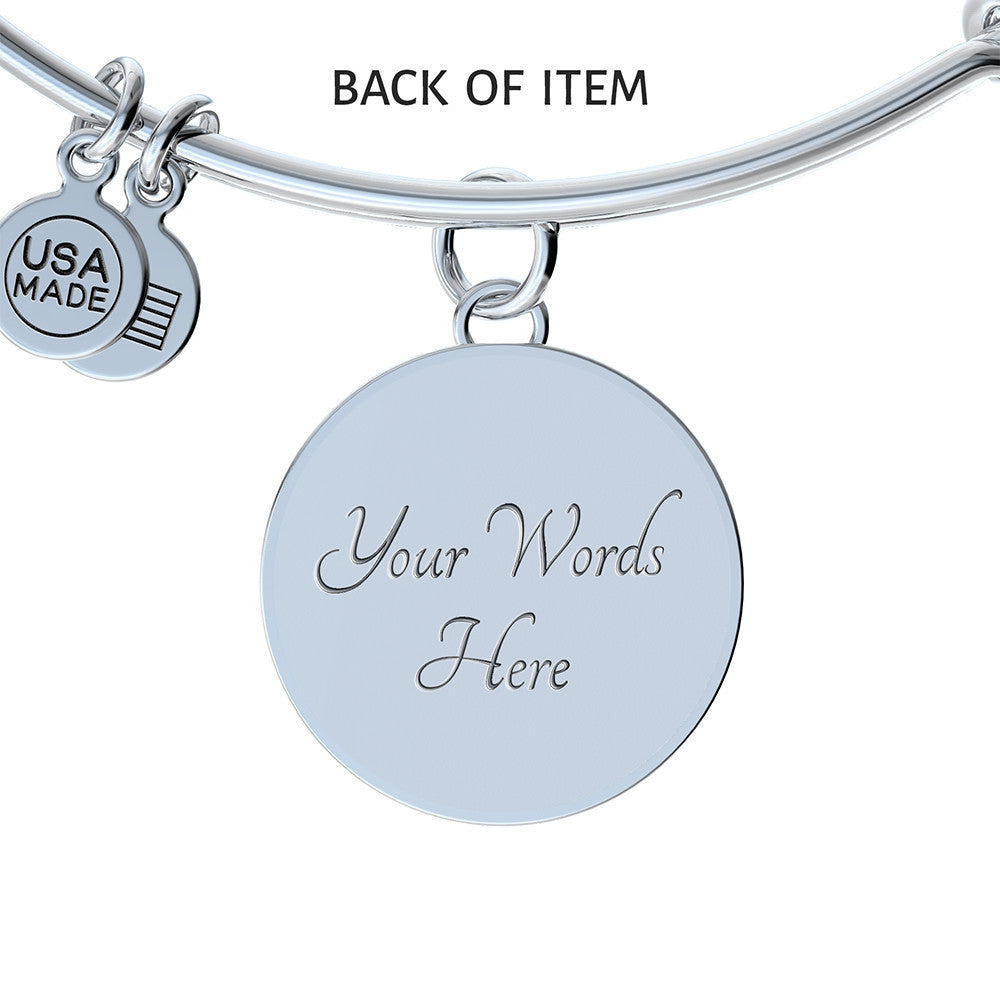 Personalized cardinal bracelet showing optional back engraving