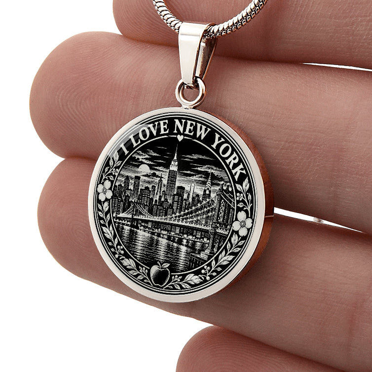 Silver New York City necklace with black and white linocut Manhattan skyline, Brooklyn Bridge, flowers and I Love New York lettering