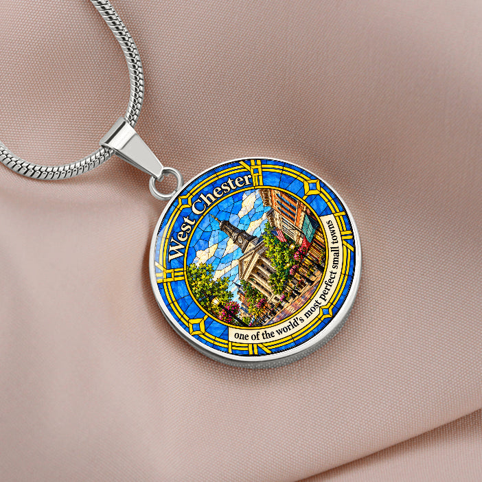 Silver West Chester Pennsylvania necklace with blue and gold stained-glass artwork, Chester County Courthouse clock tower and historic downtown buildings