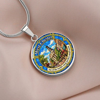 Silver West Chester Pennsylvania necklace with blue and gold stained-glass artwork, Chester County Courthouse clock tower and historic downtown buildings