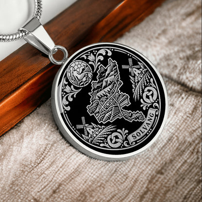 Silver Solvang California necklace with Danish windmills, traditional village buildings, ornamental flowers and SOLVANG inscription