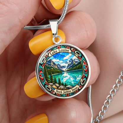 Silver Lake Louise Alberta necklace featuring turquoise glacial lake, snow-covered Canadian Rockies, evergreen forest and colorful stained-glass border