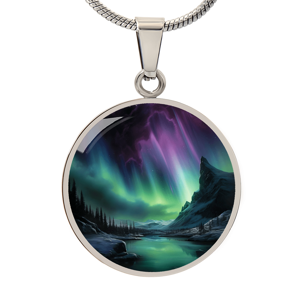 Silver Northern Lights necklace featuring Aurora Borealis artwork on a circular pendant, a celestial jewelry gift for nature lovers.