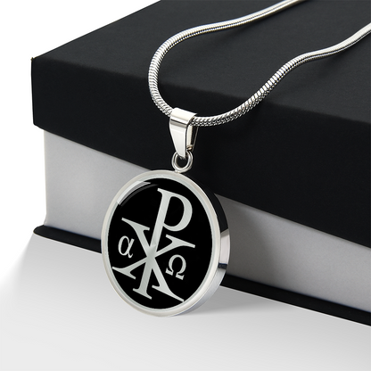 Silver Chi Rho necklace featuring the ancient Christian XP Christogram symbol on a circular pendant.