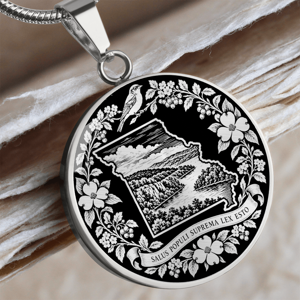 Silver Missouri State necklace with Missouri outline, Ozark mountain scenery, Eastern bluebird-inspired bird, dogwood flowers and Latin motto
