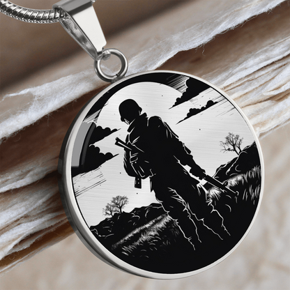 Soldier silhouette necklace with black-and-white illustration of an armed service member walking through a rugged landscape on a round pendant.