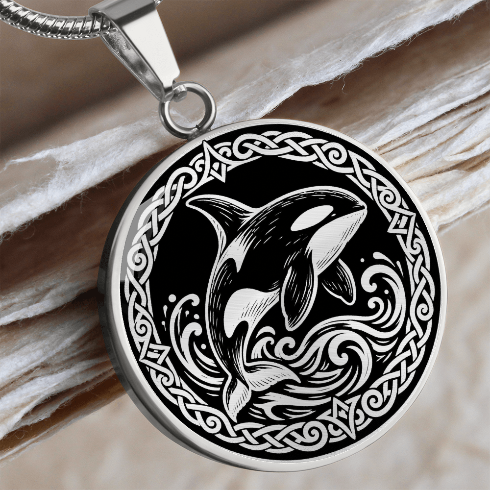 Silver orca whale pendant necklace with Viking knotwork border and ocean waves