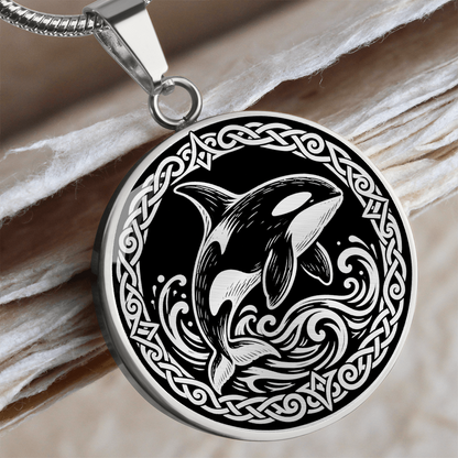 Silver orca whale pendant necklace with Viking knotwork border and ocean waves