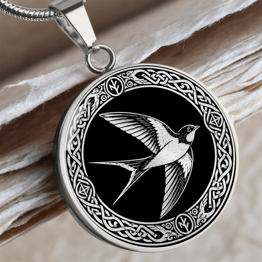 Close-up of swallow bird necklace pendant