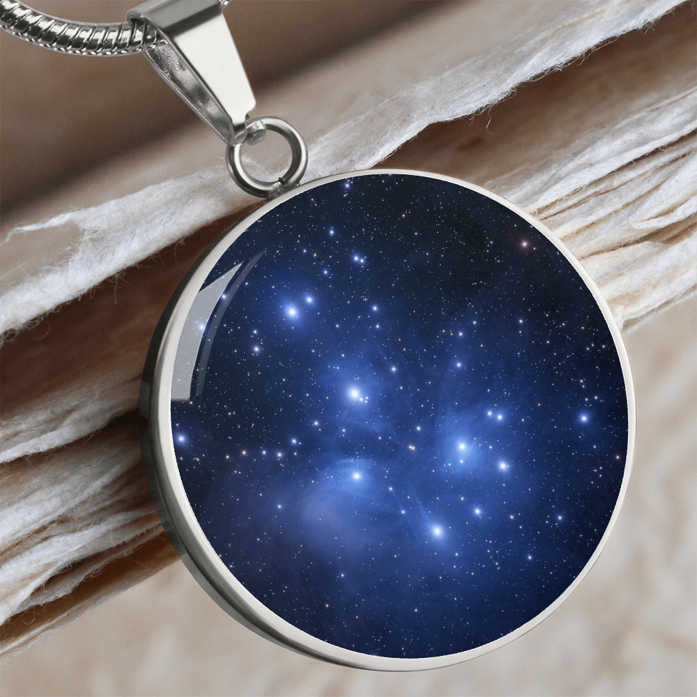 Silver Pleiades star cluster necklace featuring Seven Sisters astronomy artwork on a circular pendant.