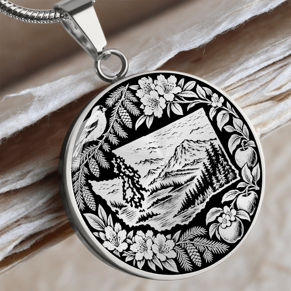 Silver Washington State nature necklace with mountain forest landscape, perched bird, flowers, ferns and botanical border
