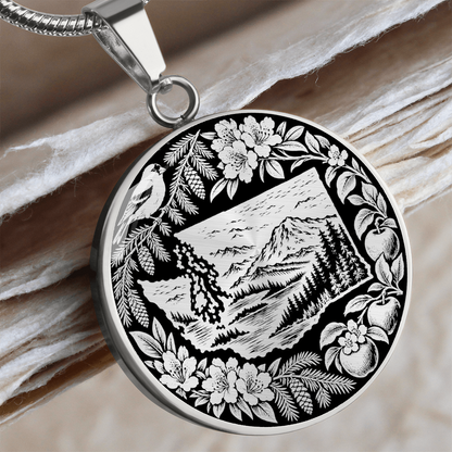 Silver Washington State nature necklace with mountain forest landscape, perched bird, flowers, ferns and botanical border