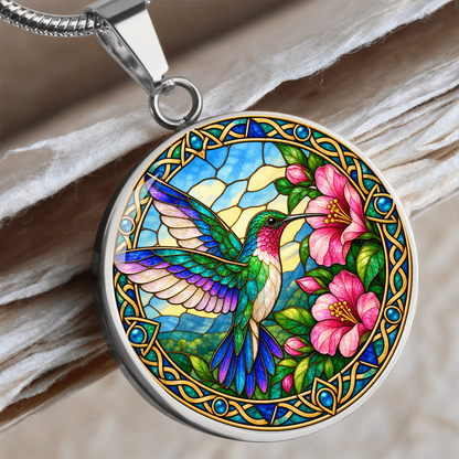 Hummingbird pendant necklace featuring colorful bird artwork