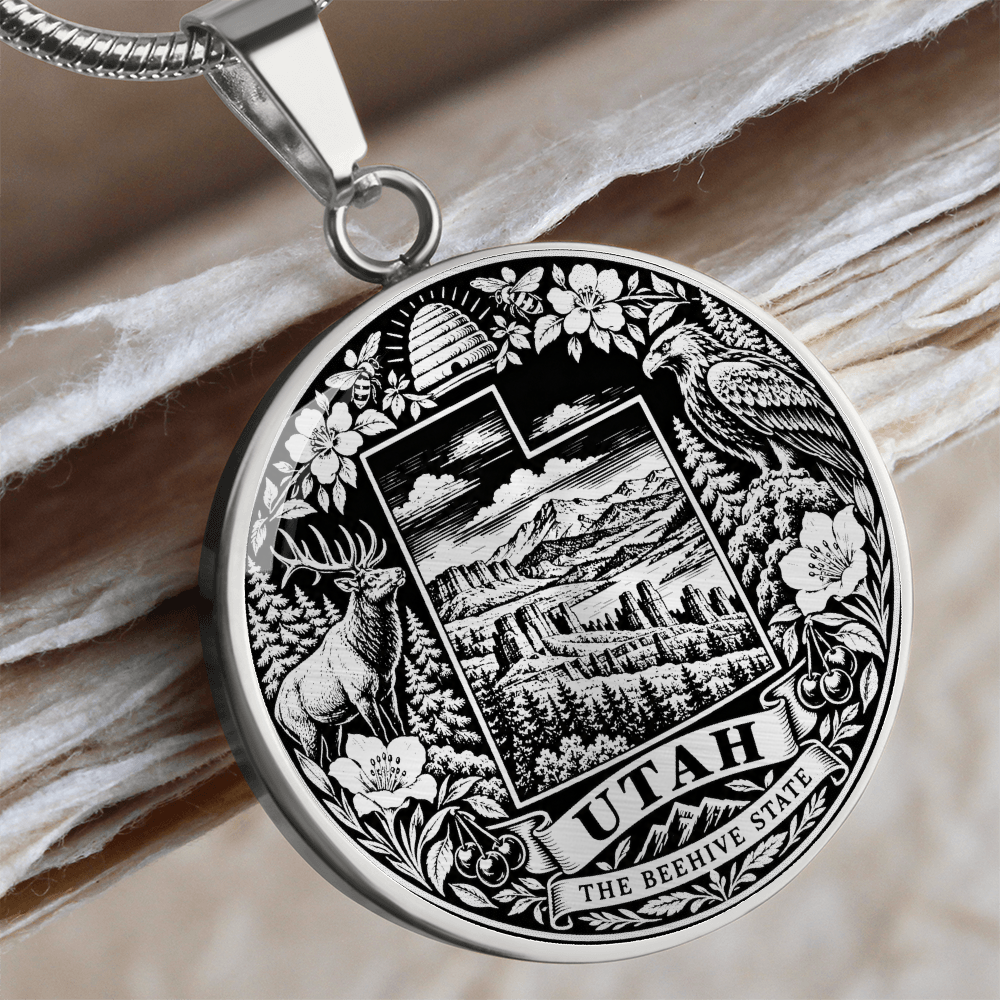 Silver Utah State necklace featuring Utah map outline, beehive, mountain forest, elk, eagle and Beehive State inscription