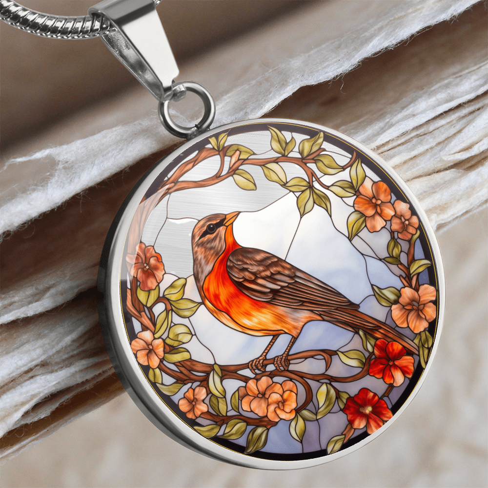 Silver Stained-glass-inspired robin necklace featuring an orange-breasted bird perched among peach and red flowers on a round pendant.