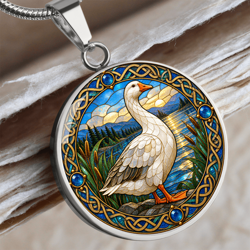 Close-up of goose bird necklace featuring decorative glass-style artwork