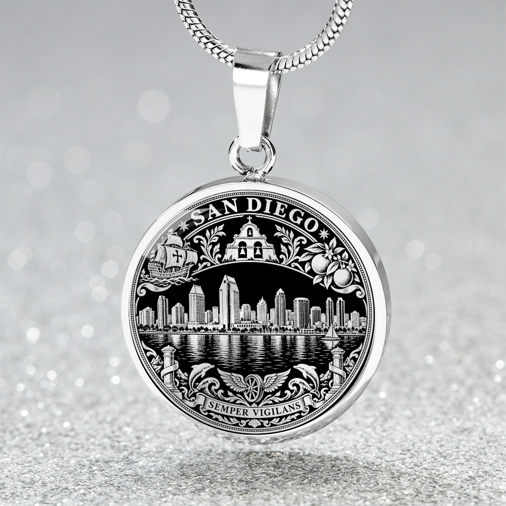 silver finish San Diego skyline pendant with waterfront buildings, black and gold artwork and ornate city emblem border