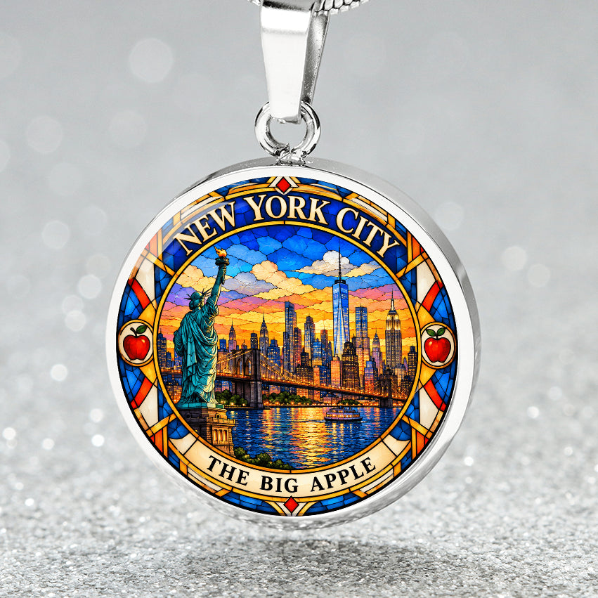 New York City skyline necklace in silver finish with Manhattan skyscrapers, One World Trade Center, Brooklyn Bridge and colorful sunset