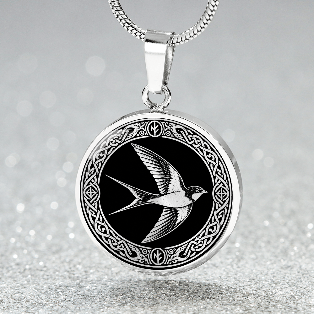 Close-up of swallow bird necklace pendant