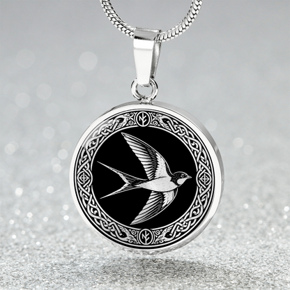 Close-up of swallow bird necklace pendant