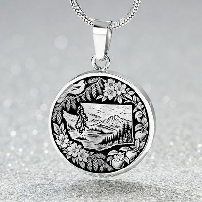 Silver Washington State nature necklace with mountain forest landscape, perched bird, flowers, ferns and botanical border