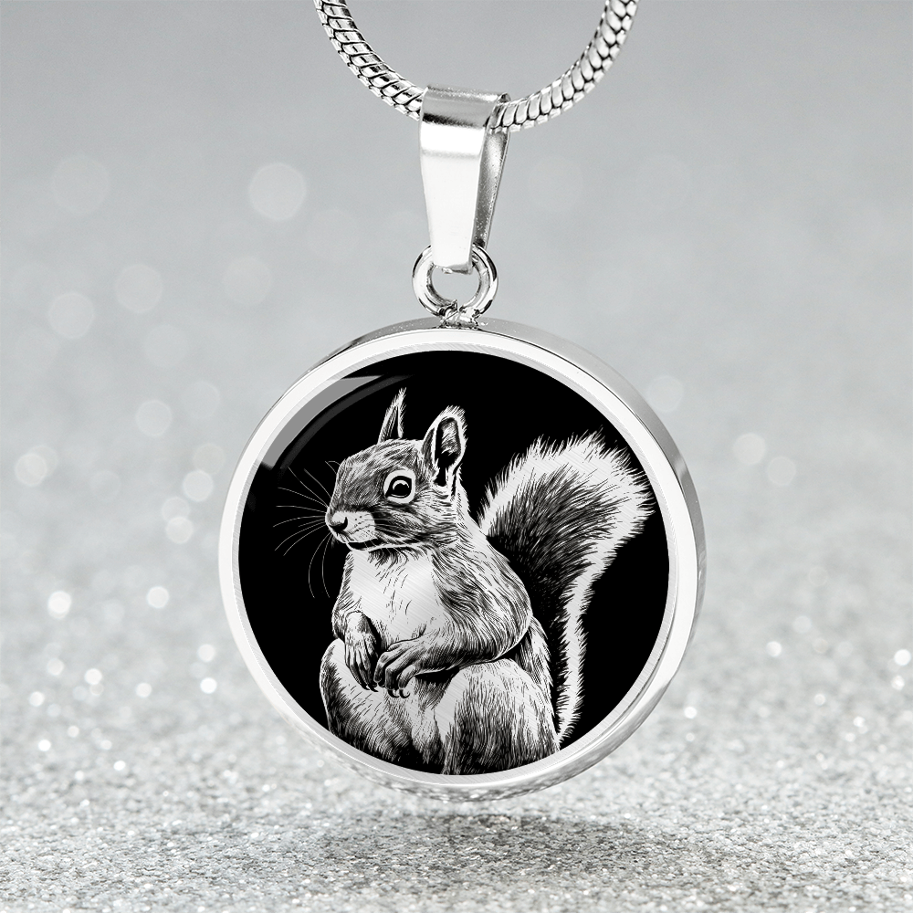 silver finish squirrel necklace featuring a silver-toned squirrel illustration with bushy tail against a black circular background.