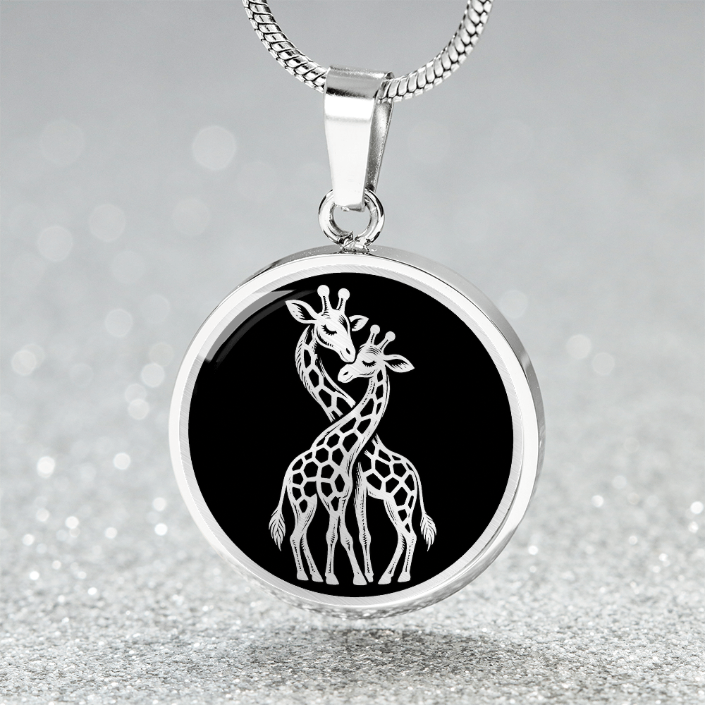 Two giraffes necklace featuring white-on-black illustration of giraffes standing together with their long necks gracefully intertwined.