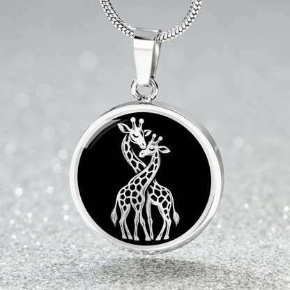 Two giraffes necklace featuring white-on-black illustration of giraffes standing together with their long necks gracefully intertwined.