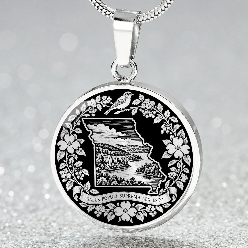 Silver Missouri State necklace with Missouri outline, Ozark mountain scenery, Eastern bluebird-inspired bird, dogwood flowers and Latin motto